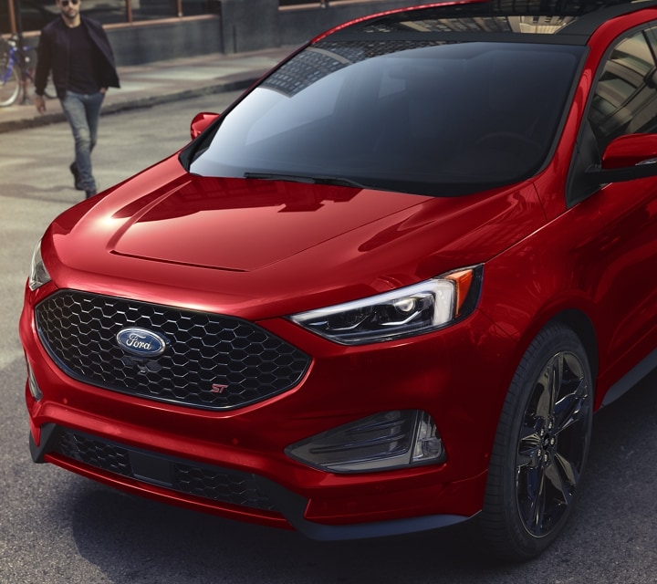 Front shot of a 2023 Ford Edge® ST model in Rapid Red