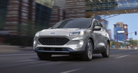  2021 Ford Escape being driven on a city street,
